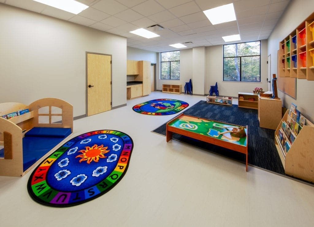 Colorful preschool classroom with play mats.